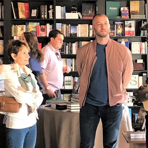 a group of people standing in a room