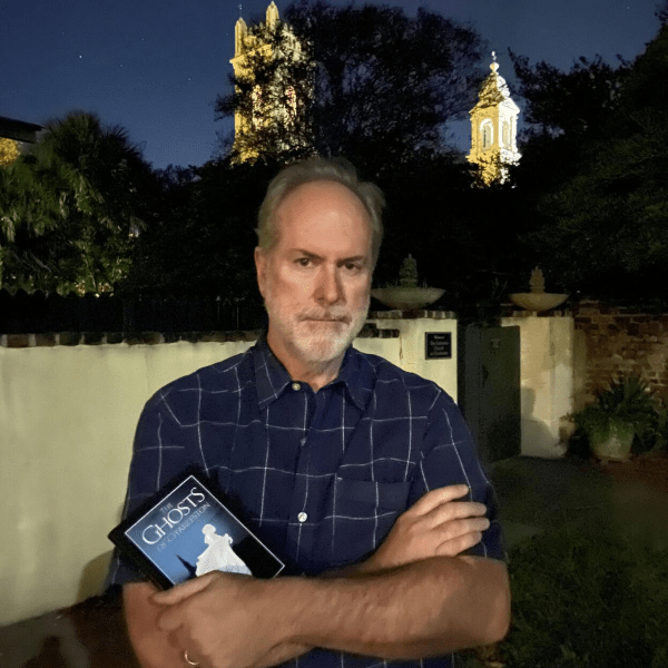 a man holding a camera